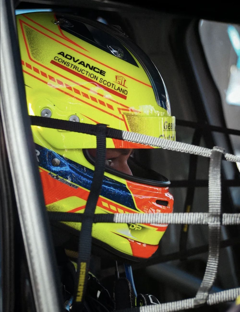 Driver helmet close-up in the car