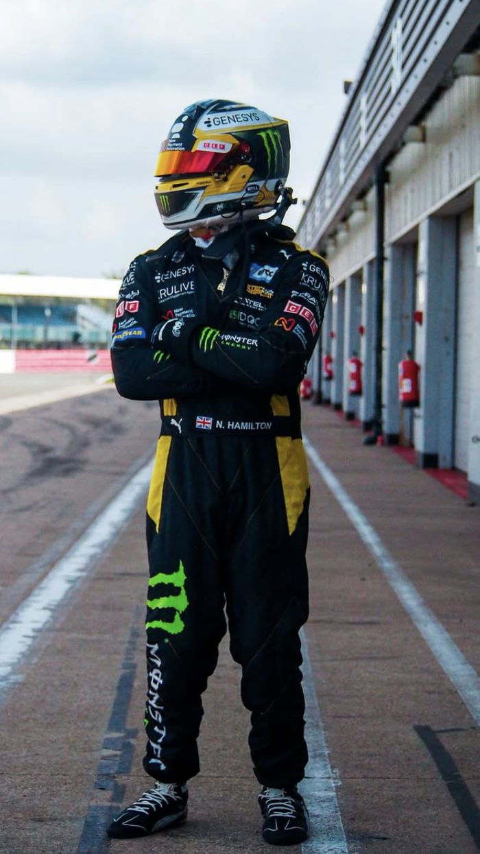 Nic Hamilton standing in the pit lane